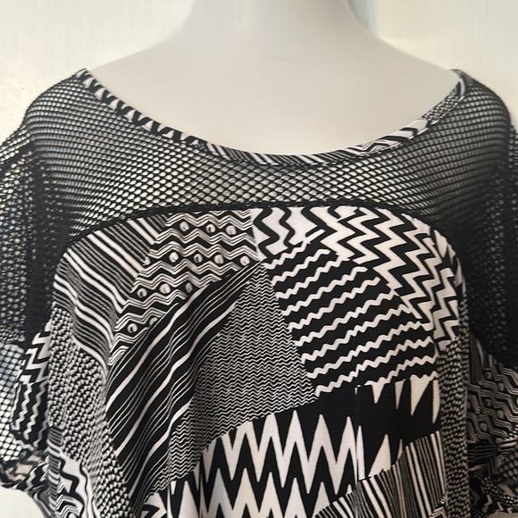 Lavish Cavish Plus Black and white Shirt with netting up top. - Picture 3 of 5